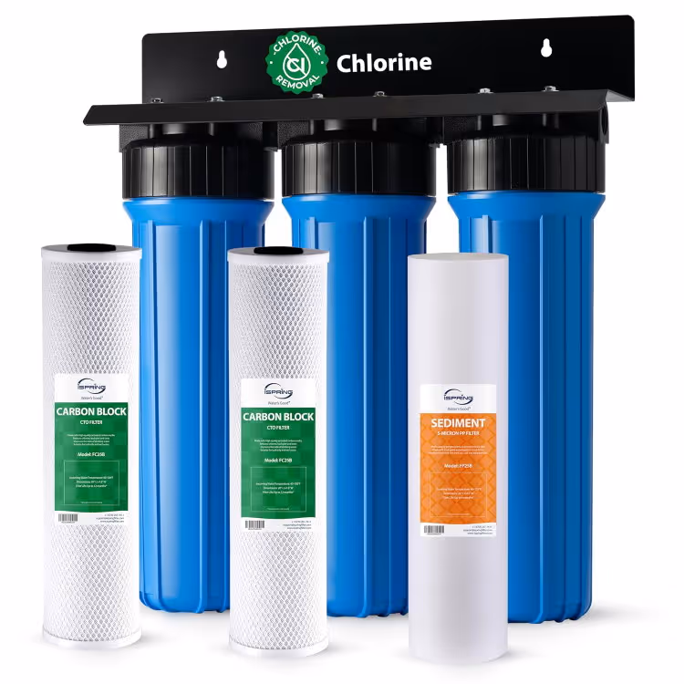 iSpring WGB32B three-stage whole-house water filter: three blue Big Blue housings on a mounting bracket with sediment and carbon-block cartridges